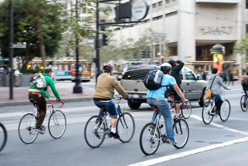 When cyclists take over road lanes, self-driving cars will operate less efficiently. Can Balcioglu/Shutterstock.com